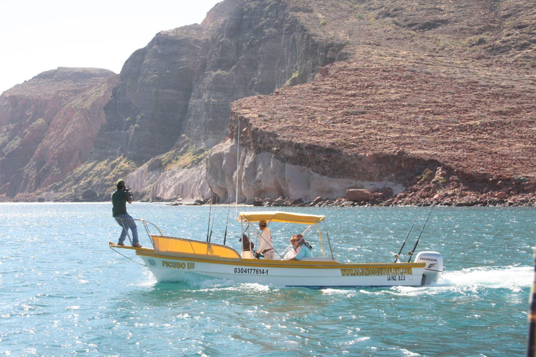 Picudo III at the red cliffs — Baja Mosquito Fleet, La Paz