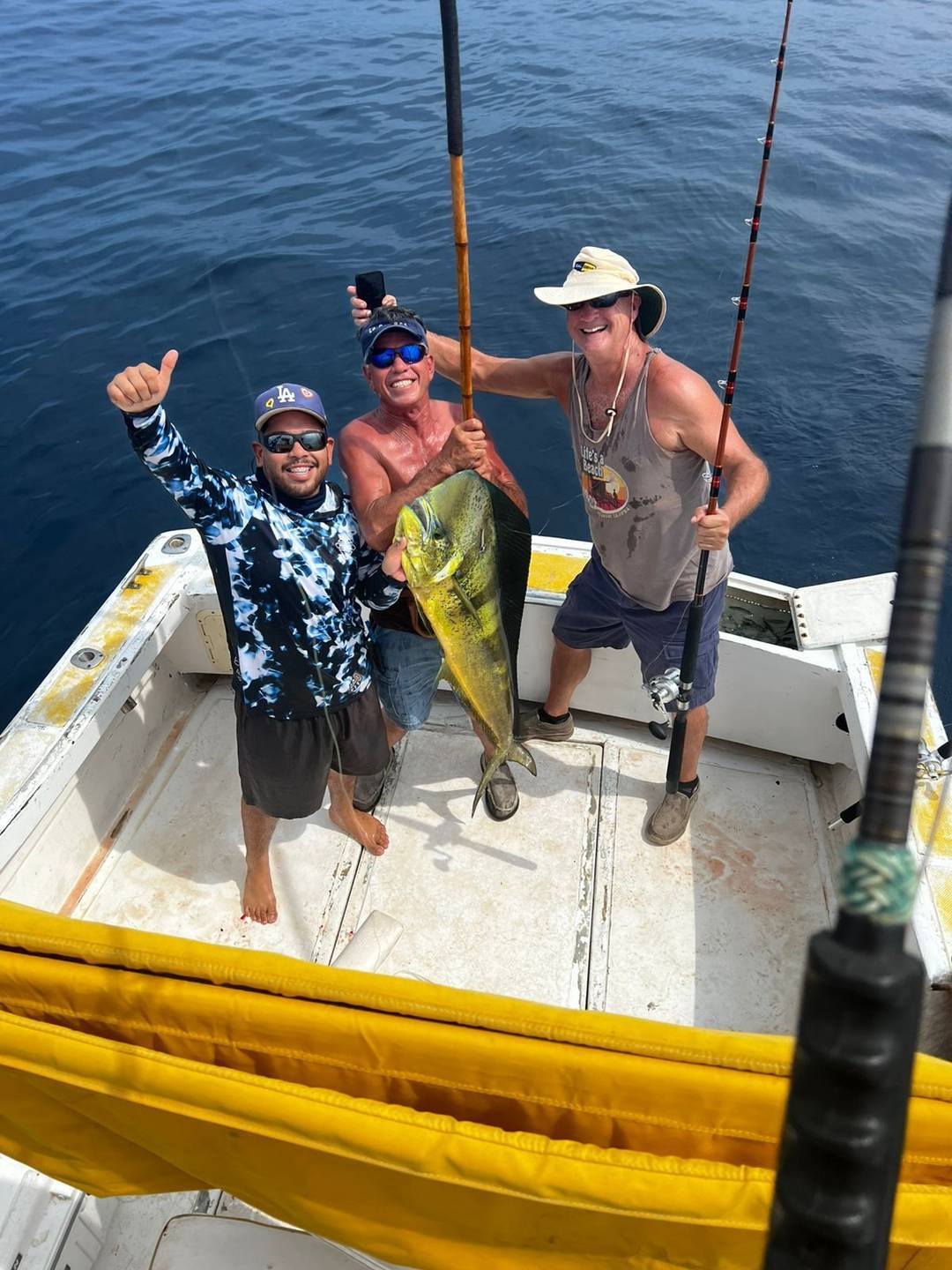 Guests celebrating a catch on board in La Paz
