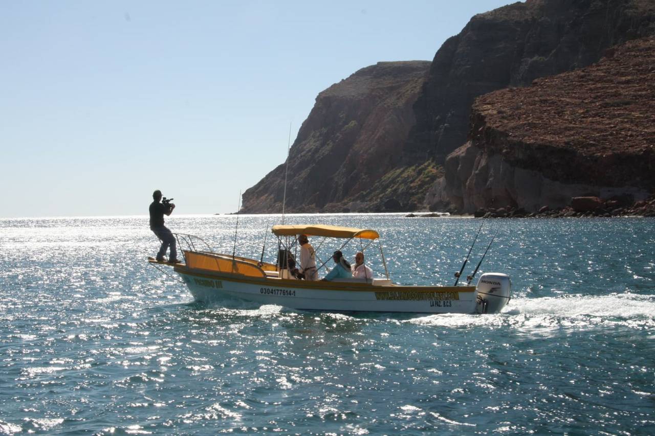 Picudo III below the cliffs — Baja Mosquito Fleet, La Paz