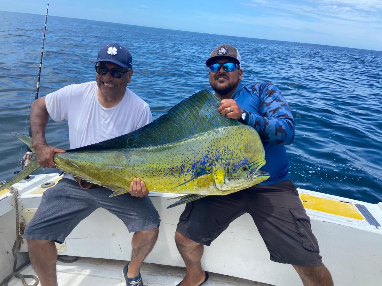 Angler with dorado caught with Baja Mosquito Fleet in La Paz, Mexico